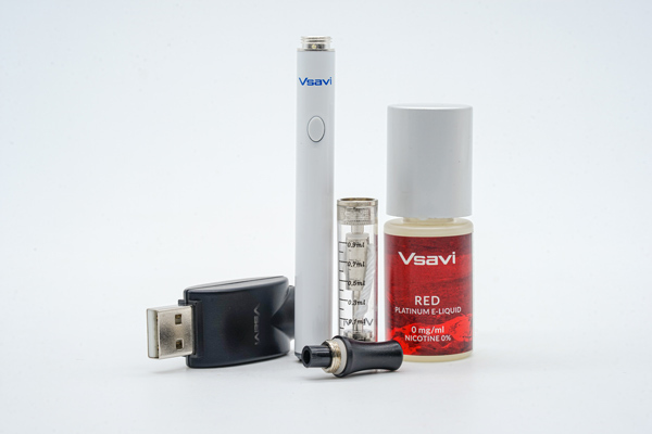 Vsavi starter kit pack Vsavi starter kit pack on a white background, including the Vsavi standard white battery, Vsavi Platinum Red vape juice, the Vsavi Ex Blank with mouthpiece removed and a USB charger.