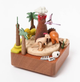 Handcrafted wooden Dinosaurs & Volcanic double go-around music box with moving dinosaur figures on a natural timber base.