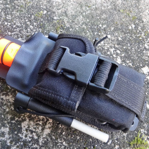 Esee pouch mounted on a custom KYDEX knife sheath. Esee pouch mounted on a custom KYDEX knife sheath.