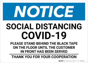 Notice: Social Distancing COVID-19 Please Stand Behind Black Tape Landscape - Wall Sign