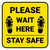 Please Wait Here Stay Safe Shoe Prints Yellow Square - Floor Sign