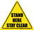 Stand Here Stay Clear Triangle - Floor Sign