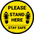 Please Stand Here Stay Safe Shoe Prints Yellow Circular - Floor Sign