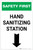 Safety First: Hand Sanitizing Station Below with Arrow Portrait - Label