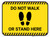 Do Not Walk Or Stand Here with Icon - Yellow - Floor Sign
