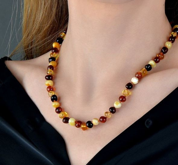Amber Beaded Necklace Made of Four Color Amber Beads.
