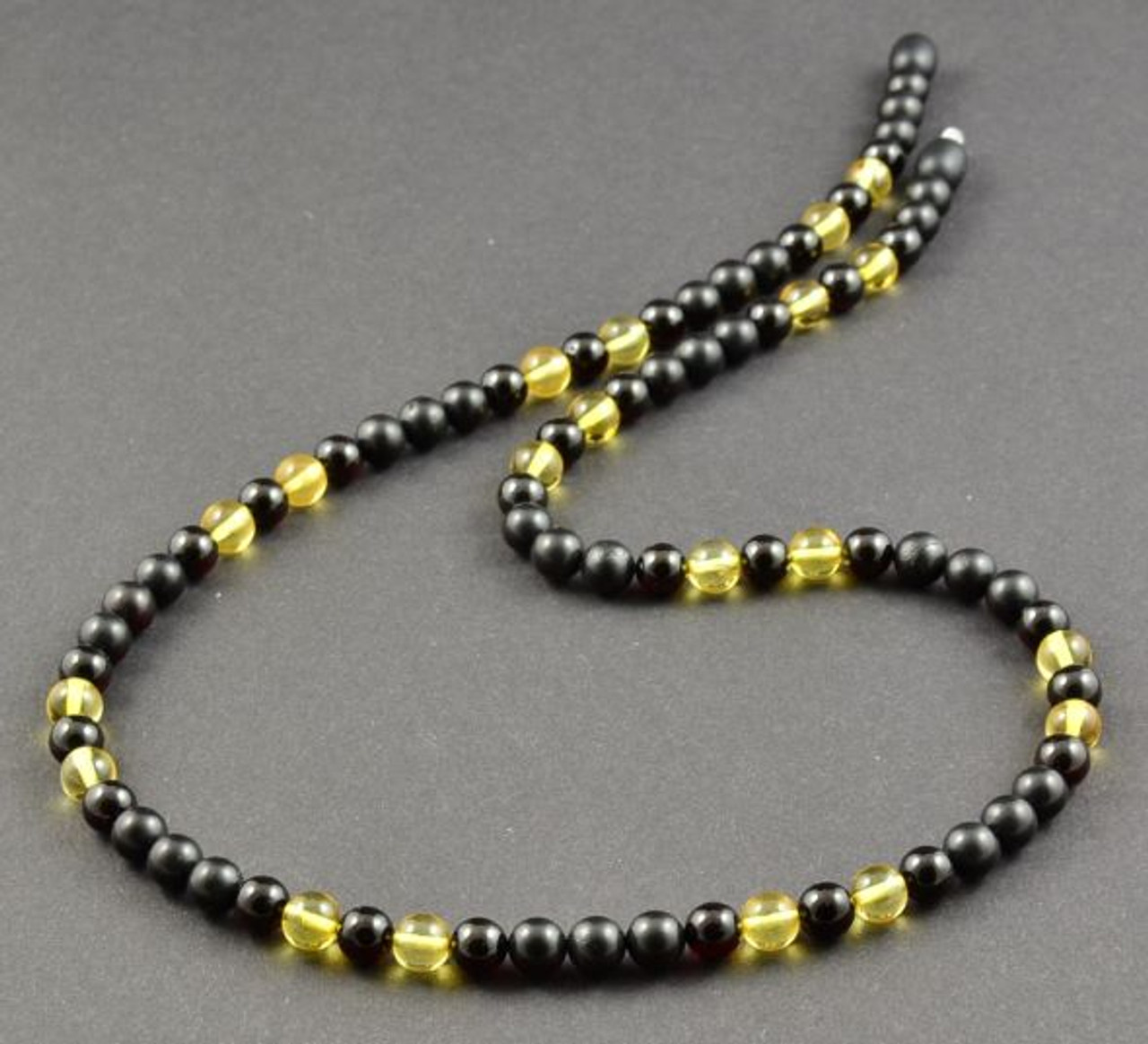 Men's Beaded Necklace Made of Black and Lemon Amber.