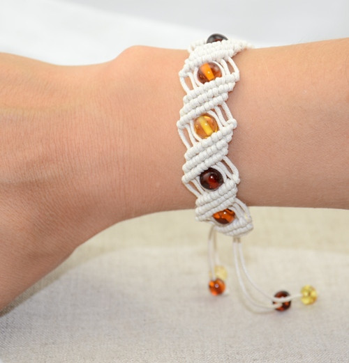 Hand knitted  bracelet with amber