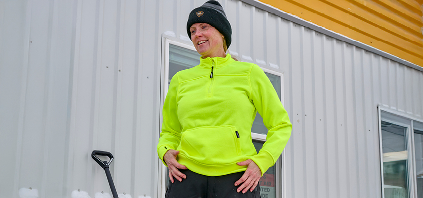 Female worker wearing HiVis sweatshirt in cold weather outdoors