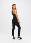 THE UPSIDE women's black Peached 28inch High Rise Pant is made from a recycled soft peached fabric with moisture-wicking, breathable and quick-drying properties.