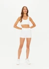 THE UPSIDE women's white Peached Harley Bra made with Recycled Peach fabric features a scoop front, scooped back, removable bust cups and moisture wicking properties; perfect for yoga, pilates or barre.