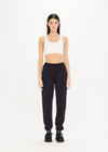 THE UPSIDE women's black Blake Track Pant is a classic, mid rise jogger made from organic cotton french terry. It features elasticated cuffs, an elasticated drawstring waist, side seam pockets and back patch pockets.