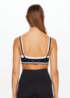 THE UPSIDE women's black double layer Form Seamless Kelsey Bra made with Form Seamless fabric has mid coverage and support, and features moisture control properties.