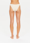 THE UPSIDE golden Sands Moss Pant is a classic, medium coverage pant in luxe cream textured fabrication with gold lurex thread and is fully lined.