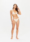 THE UPSIDE golden Sands Moss Pant is a classic, medium coverage pant in luxe cream textured fabrication with gold lurex thread and is fully lined.