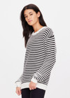 THE UPSIDE women's relaxed black and cream striped Boo Knit sweater is made from an organic combed cotton knit. This classic textured knitted sweater features soft rib cuffs, neck and hem with discreet folded arrow pip label at the cuff.
