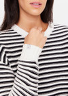 THE UPSIDE women's relaxed black and cream striped Boo Knit sweater is made from an organic combed cotton knit. This classic textured knitted sweater features soft rib cuffs, neck and hem with discreet folded arrow pip label at the cuff.