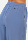 THE UPSIDE women's blue Sierra Pant is made from recycled fabric. The wide leg track pants features pockets and elastic waistband. Designed for travel.