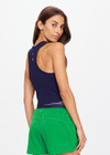 THE UPSIDE women's navy Sophie Crop made in organic cotton rib features a cropped racer back, built-in shelf bra with removable cups and an embroidered arrow at centre back; everyday luxe.
