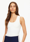THE UPSIDE women's creme Onyx Kori Crop, made with Recycled Peached fabric is designed for a full coverage fit. This scoop neck top features an internal shelf bra ideal for yoga.