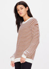 THE UPSIDE women's striped Boo Knit Sweater is made from organic cotton. The cream and tan striped Knit features a soft rib cuff, neck and hem. Designed for leisure and recovery.