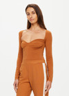 THE UPSIDE women's brown The Banya Romy Top is made with recycled viscose for a relaxed fit. This long sleeve lifestyle top is slim fitting with a sweetheart neckline.