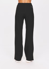 THE UPSIDE women's black Petra Flare is made from a lenzing viscose soft suiting fabrication. The full length tailored pant features side pockets and an elasticated waistband. Designed for walking and recovery.