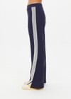 THE UPSIDE women's navy blue Petra Flare is made from lenzing viscose soft suiting fabric. The full length, soft tailored pant feature side seam pockets and a soft elasticated waistband.
