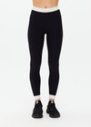 THE UPSIDE women's Jagger 25inch Midi Pant is made from recycled soft peached with moisture wicking, breathable and quick drying properties. The mid rise yoga legging features textured stripe elastic waistband and cuffs.