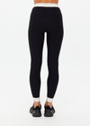 THE UPSIDE women's Jagger 25inch Midi Pant is made from recycled soft peached with moisture wicking, breathable and quick drying properties. The mid rise yoga legging features textured stripe elastic waistband and cuffs.