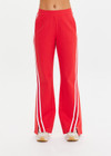 THE UPSIDE women's red Petra Flare Pant is made from a sustainable lenzing viscose material that features a contrast white knitted tape down the sides. This track pant features an elasticated waist and side pockets.
