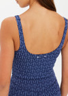 THE UPSIDE women's blue abstract print Farrow Lucia Scoop Crop is made from a recycled jacquard rib fabric with breathable, quick drying and moisture wicking properties. This crop top features a scoop neck and back, a shelf bra and removable cups. Designed for yoga, pilates and barre.