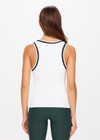 THE UPSIDE women's white Kirsty Rib Tank Top is made in recycled moisture wicking ribbed fabrication. The performance tank features a stylish stripped rib on the neckband and armholes. Designed for tennis.