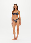 THE UPSIDE women's floral batik print Gulf Heidi Bra is made from soft recycled ribbed fabric. The balconette swim bra feature underwire cups, straight back straps with adjusters and metal black clip opening.