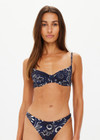 THE UPSIDE women's floral batik print Gulf Heidi Bra is made from soft recycled ribbed fabric. The balconette swim bra feature underwire cups, straight back straps with adjusters and metal black clip opening.