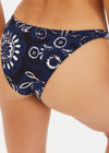 THE UPSIDE women's floral batik print Gulf Christy Pant is made from soft recycled ribbed fabric. The low coverage bikini pant is fully lined.
