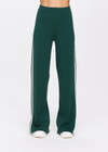 THE UPSIDE women's green Les Border Freya Knit Pant is made from a viscose blend. The knitted straight leg pant features a white side stripe and elasticated waistband for style and comfort. Designed for walking and recovery.