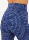 THE UPSIDE women's blue abstract print Farrow 25 inch High Midi Pant is made from a recycled jacquard rib fabric with breathable, quick drying and moisture wicking properties. This high waisted legging features a V-shaped front and is designed for yoga, pilates and barre.
