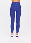 THE UPSIDE women's blue Carnaby 25 inch Midi Pant is made from a soft recycled ribbed fabrication. This mid rise legging features a soft folded waistband and is designed for yoga, pilates and barre.