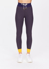 THE UPSIDE women's yellow Dunes 25 inch Midi Pant is made from recycled textured rib fabrication with moisture wicking properties. The mid-rise pant is styled with navy and yellow for style and an elasticated drawcord through the waist for the perfect fit. Designed for the gym.