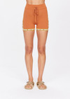 THE UPSIDE women's brown Vadella 4 inch Knit Spin Short is made from organic cotton. The knitted shorts are soft and supportive with an adjustable drawcord waist line. Designed for leisure and recovery.