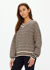 THE UPSIDE women's neutral abstract print Castilla Millie Knit Sweater is made with an organic cotton blend knit jacquard. This relaxed knitted sweater features a high neckline with striped rib. Designed for everyday wear.