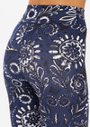 THE UPSIDE women's floral batik print Gulf 25 inch Midi Pant is made from soft recycled ribbed fabric. The mid rise legging features a soft folded waistband.