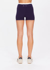 THE UPSIDE women's navy Montage Speechless Short is a knitted short with cream side panels and soft waistband for comfort. Designed for light movement and recovery.