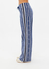 THE UPSIDE women's blue striped Joie Jetset Straight Leg Pant is made from a blue and cream cotton blend. The straight leg pant is styled with a knitted stripe tape down side seams and tonal arrow on the back pocket, they feature front and back pockets and elastic waist with drawcord for practicality. Designed for recovery and leisure.