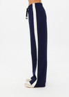 THE UPSIDE women's navy Hamptons Saylor Wide Leg Pant is made from a soft suiting lenzing fabrication. The wide leg pant is fitted with cargo pockets and an elasticated waistband with drawcord. Designed for leisure and recovery.
