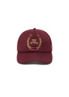 THE UPSIDE women's maroon Cheval Classic Trucker Hat features a foam front and mesh back with an adjustable snapper.
