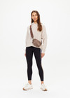 THE UPSIDE women's leopard Panthera Voyage Crossbody Bag is made from recycled fabric. The mini crossbody bag features adjustable straps. Designed for travel.