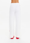 THE UPSIDE women's white Pacific Wide Leg Cody Pant is made from organic cotton. The track pant features pockets and elastic waistband. Designed for tennis and pickleball.