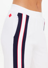 THE UPSIDE women's white Pacific Wide Leg Cody Pant is made from organic cotton. The track pant features pockets and elastic waistband. Designed for tennis and pickleball.